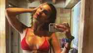 The Weeknd likes Bella Hadid's sexy red bikini photo on Instagram