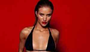 Rosie Huntington-Whiteley shares sensational photo as she poses in lacy red lingerie 