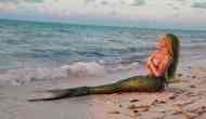Watch Nicki Minaj go topless as a mermaid for 'Bed' music video with Ariana Grande