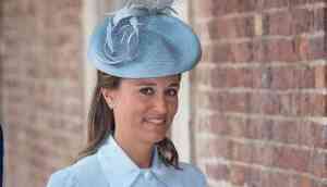 Pregnant Pippa Middleton flaunted her baby bump in pastel blue dress for her nephew's christening