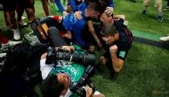 FIFA World Cup 2018: Photographer gets caught up in Croatia's celebration and gets a kiss