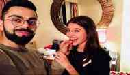 Virat Kohli shared a kissing picture with Anushka Sharma; fans trolled him for hairstyle and said ‘bal ud gaye bhai k?’