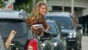 Woman flashes her breast at David Beckham out of her car window in Miami