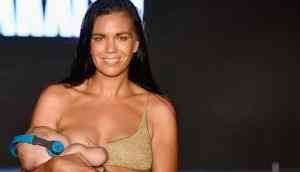 Swimsuit model Mara Martin breastfeeds her daughter while walking Sports Illustrated Swimsuit Runway