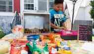 Watch how police and health dept come together to help a US boy keep his hot-dog stand