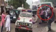 Watch Video: Allahabad University's girls blocks BJP chief Amit Shah's convoy; cops pulls their hair and beat them with stick