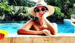 Happy Birthday! See Meghan Markle's slutry photos on beach with Prince Harry beach in Jamaica