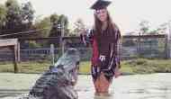 Graduation photos: Texas student poses with 14-ft-long alligator 