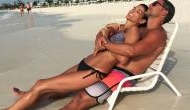 Hot and steamy: Watch Angie Harmon flaunts her toned body in bikini along with Boyfriend Greg Vaughan
