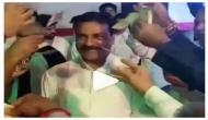 Mumbai Congress leader showered with cash as he entered a Ganpati event as a guest; video goes viral