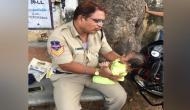 Heartwarming! Mother forced to bring her baby to the exam centre; Telangana cop babysits while she gives her exams