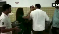 Watch: BJP Councillor Manish thrashes police officer in Meerut after spat at a restaurant over food; attacks female colleague