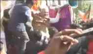 Watch: Amit Shah fell off the stage during an election rally in Madhya Pradesh, gets trolled on Twitter