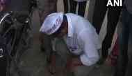 MP Assembly Election 2018: Rashtriya Aamjan Party candidate polishes shoes to please voters in Madhya Pradesh