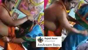 baba rubs followers buttocks video