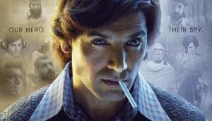 John Abraham looks intense and disguised in the first poster of his next RAW - Romeo Akbar Walter, also starring Mouni Roy