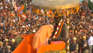Modi chants echo in Varanasi as Prime Minister's road show turns city into 'saffron tsunami'
