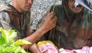 Army personnel rescue newborn baby in Kerala's worst flood-hit Wayanad
