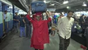 At Bhopal's railway station meet Lakshmi, the woman coolie