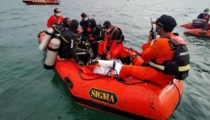 Indonesia's crashed plane likely ruptured when hitting waters: Chief investigator