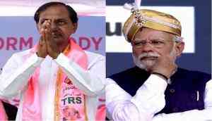Prime Minister Narendra Modi (right), Telangana Chief Minister K Chandrashekar Rao (left)