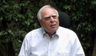 CBI is 'uncaged parrot with saffron plumes’: Sibal on raids on Sisodia