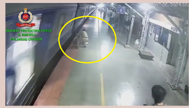 Quick-thinking RPF officer saves girl from slipping under train [Watch ...