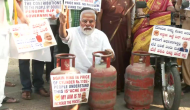 Modi Masks and Empty Cylinders: Congress protests against LPG price hike in Bengaluru
