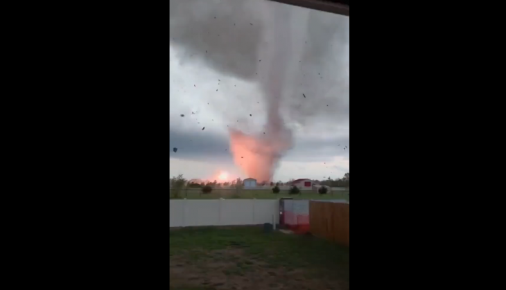 Scary: Watch man continues to film furious tornado until it comes under ...